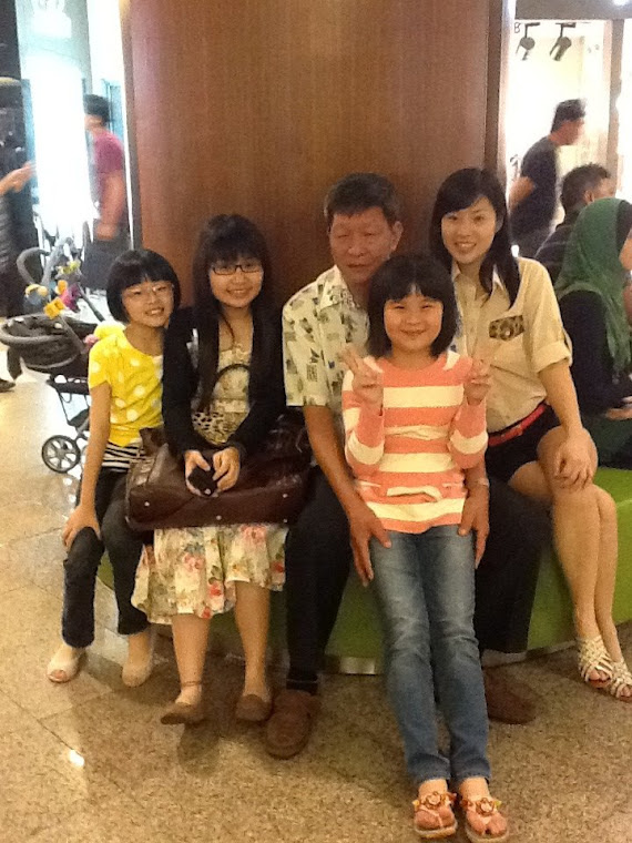 With grandfather,aunt and cousin.
