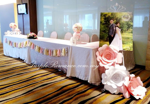 photo booth backdrop with giant paper flowers in pastel colours, bunting, logo, angelababy wedding, park royal hotel kuala lumpur, props, photo taking, ivory colour, elegant, simple, pretty, beautiful, bespoke, custom design, album table, love corner, reception table