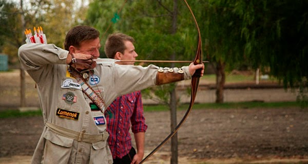 Byron Ferguson, su arco y su hijo