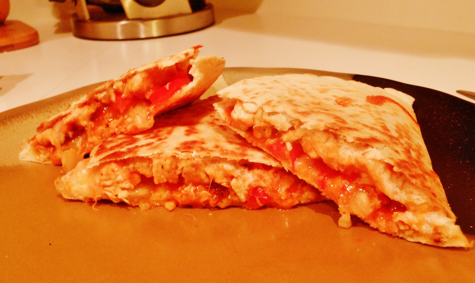 A Dynamite Bite Fiery Hawaiian Chicken Quesadilla
