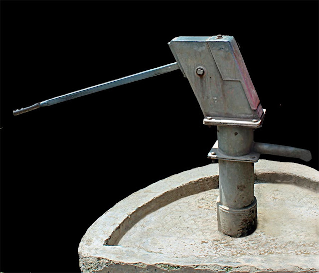 Stock Pictures Photo of a hand pump from India