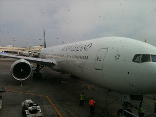 a large white airplane at an airport