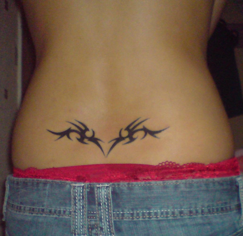 http://2.bp.blogspot.com/-l2n4QIF5TlA/TwBHFAWK5VI/AAAAAAAACdU/A1Fmk9tcdaw/s1600/Tribal-Women-Tattoo-Design-for-Lower-Back-2011.jpg