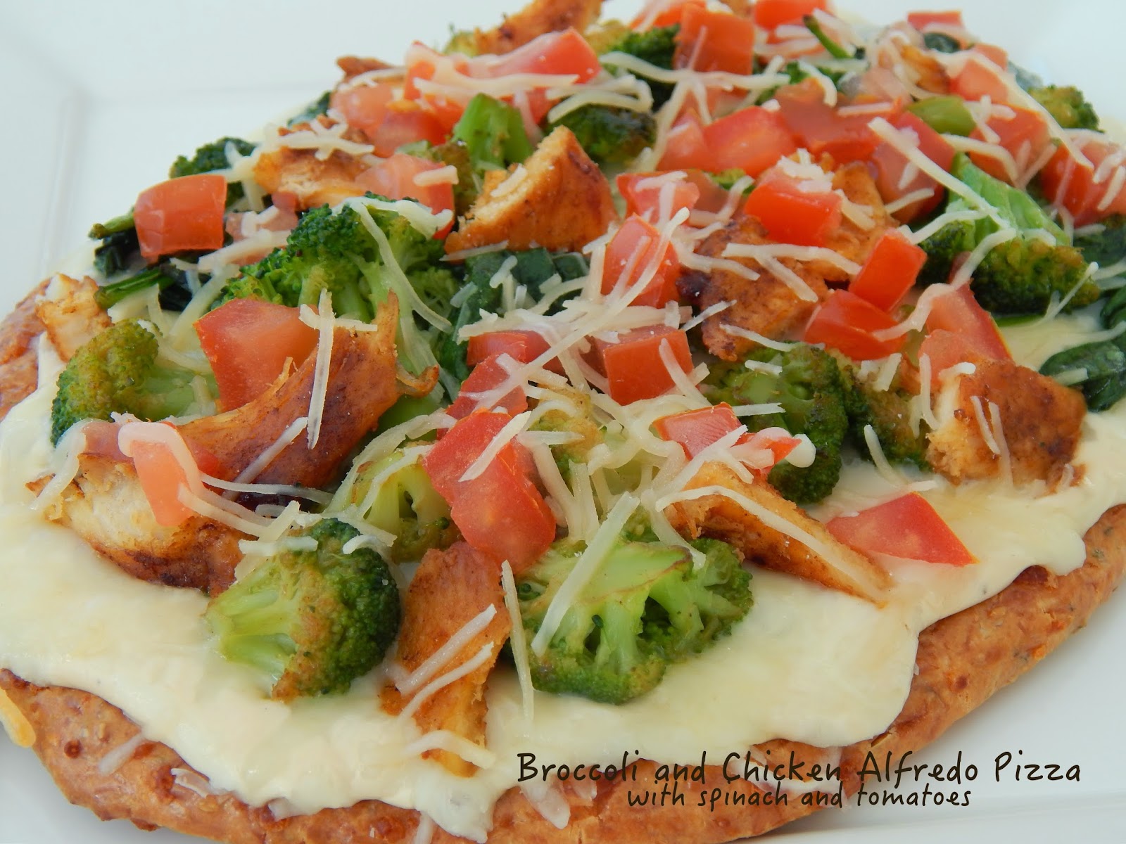 Broccoli and Chicken Alfredo Pizza with Spinach and Tomatoes Cut The