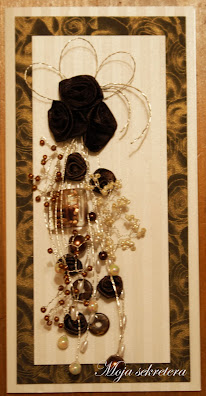 kartka urodzinowa wykonana z drutu florystycznego i koralików w kolorze brązowym