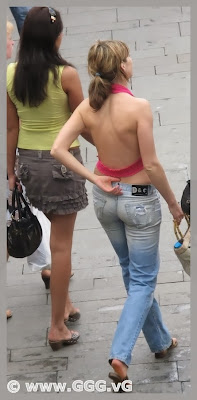 Girl in tight jeans on the street 