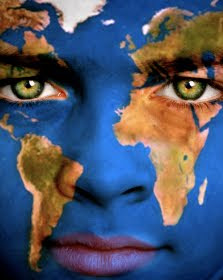 Women's face with a world map painted on it 