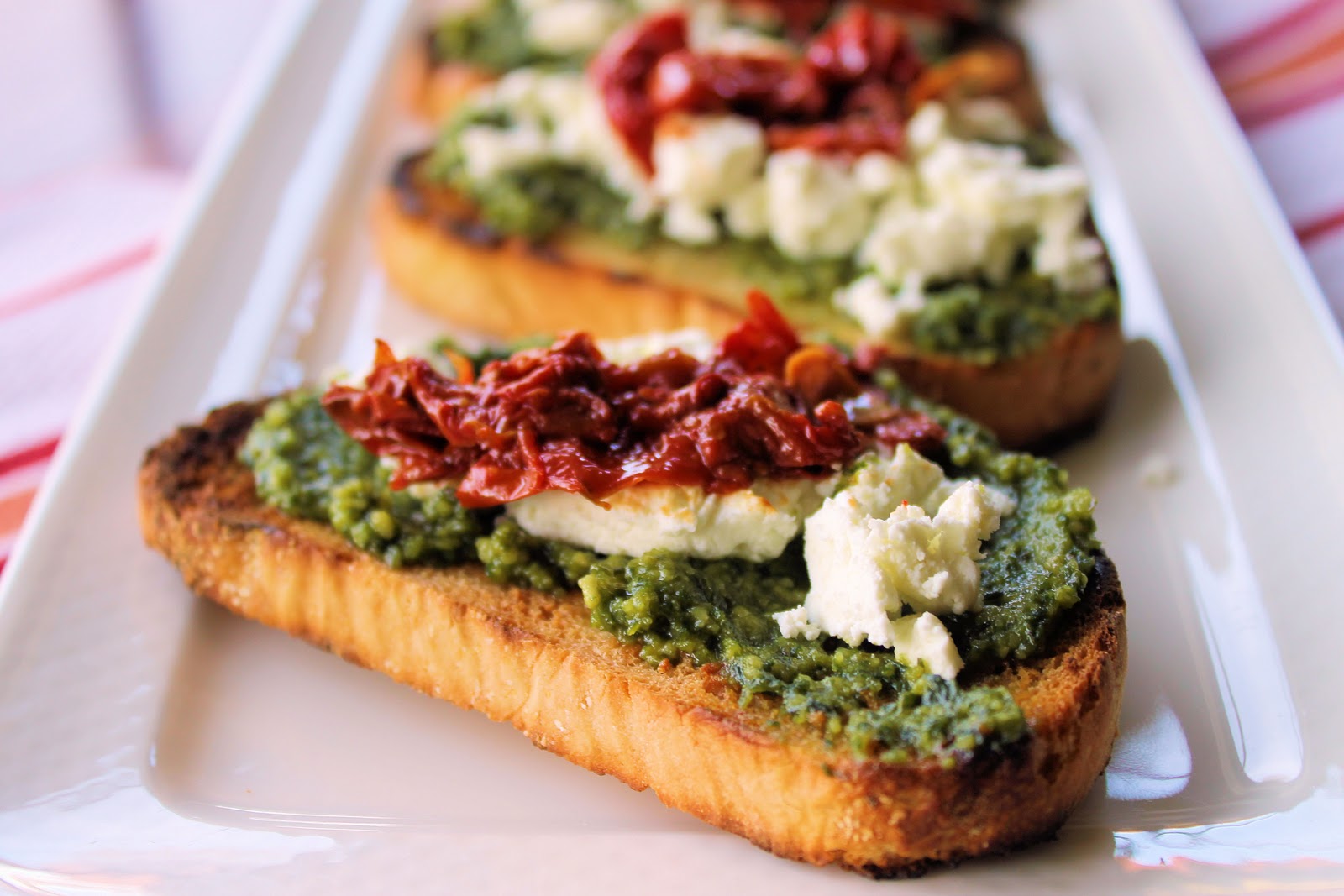 Savoir Faire Goat Cheese, Basil Pesto and Roasted Tomatoes Crostinis