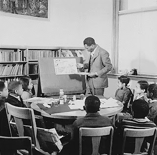 Jacob Lawrence teaching school children at the Abraham Lincoln School.