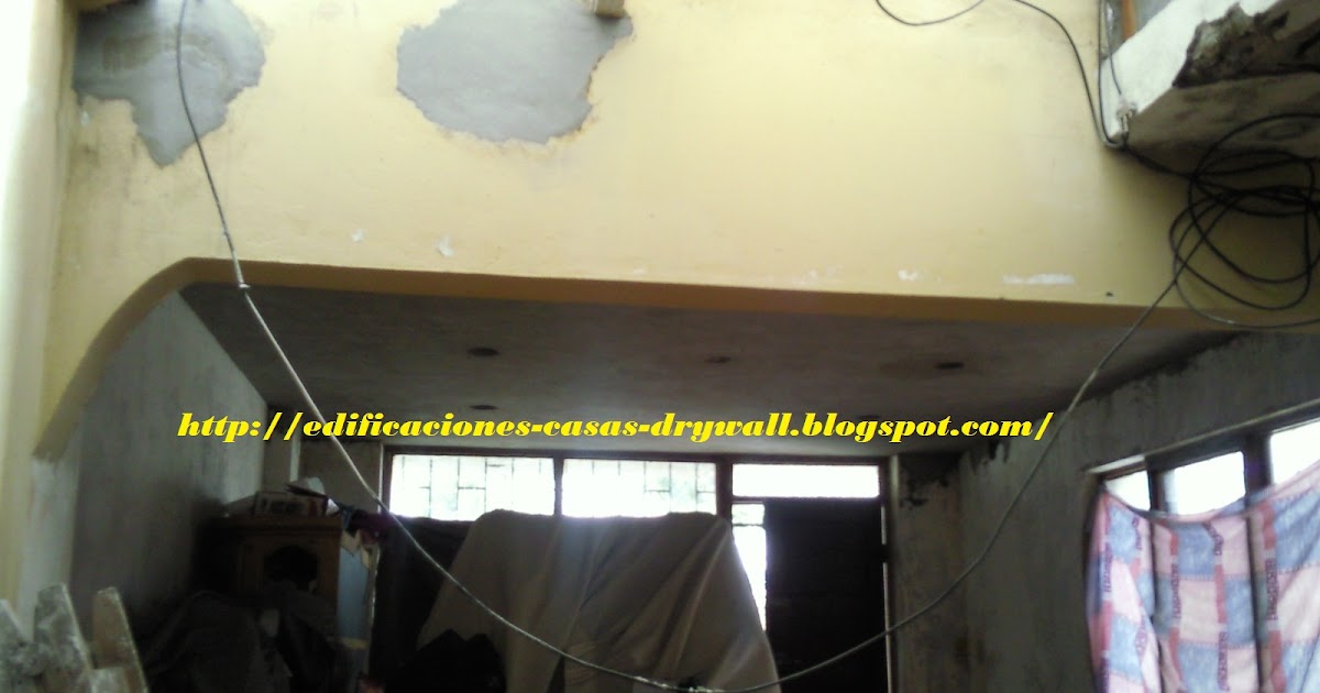 MMD construcciones: Escalera con descanso triangular y pasos de madera