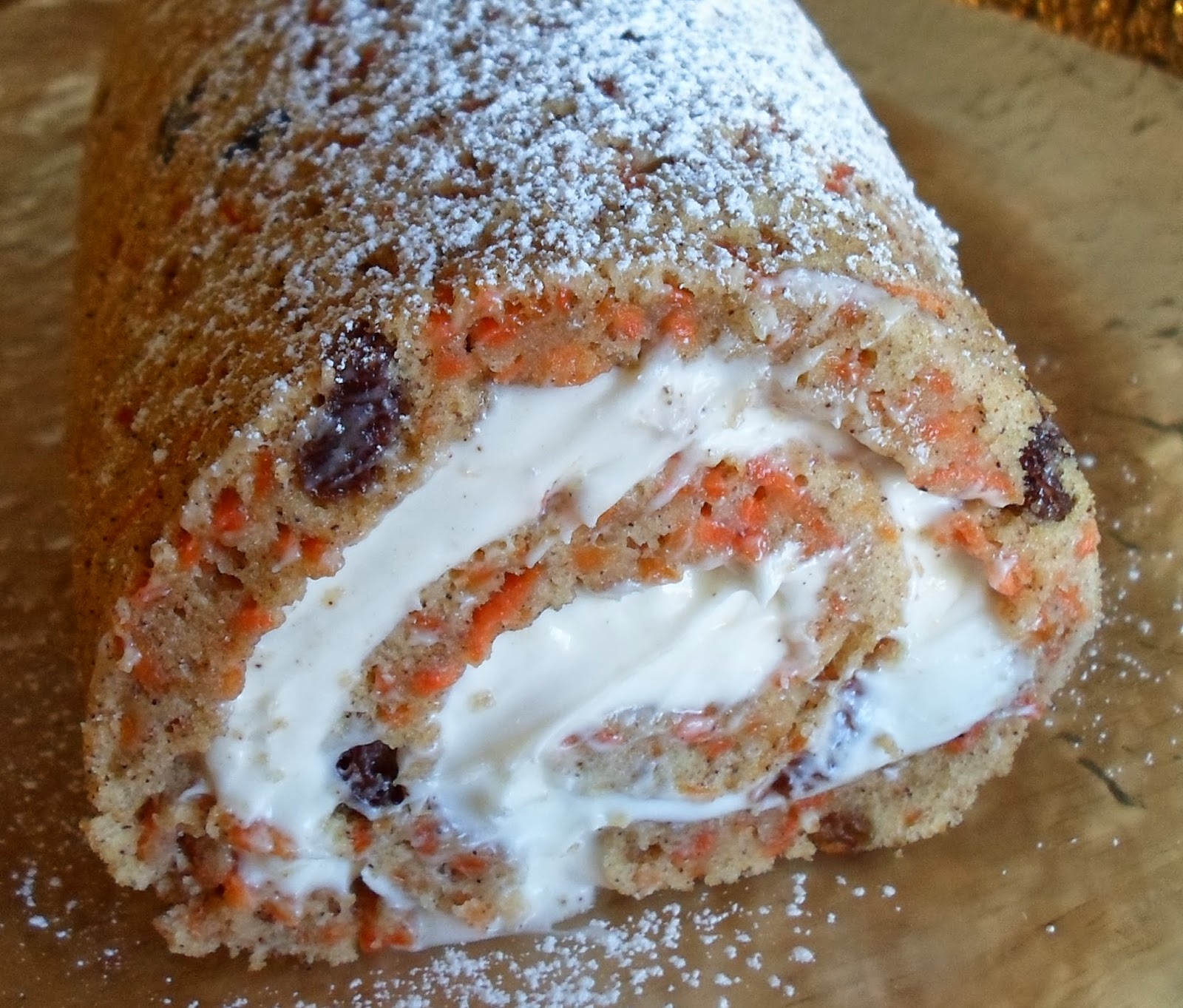 Happier Than A Pig In Mud Carrot Cake Roll with Cream Cheese Filling