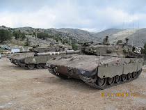 A pair of home-built Israeli tanks guarding the Syrian border, Golan Heights (annexed by Israel)