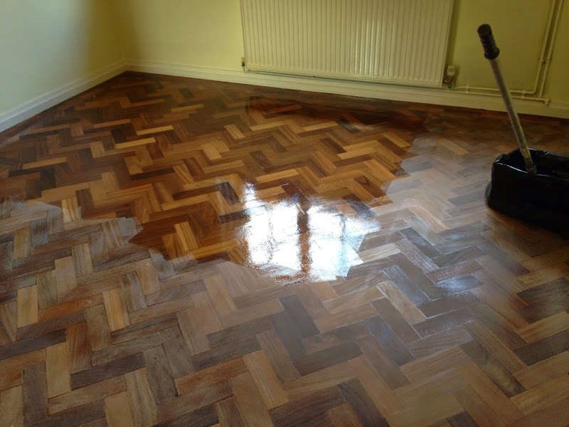Lacquered parquet hard wood floor what a sheen! Art of Clean UK