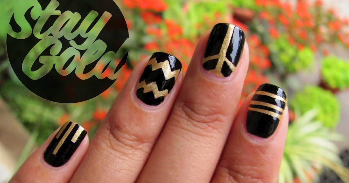 1. Matte Black and Gold Geometric Nail Art - wide 5