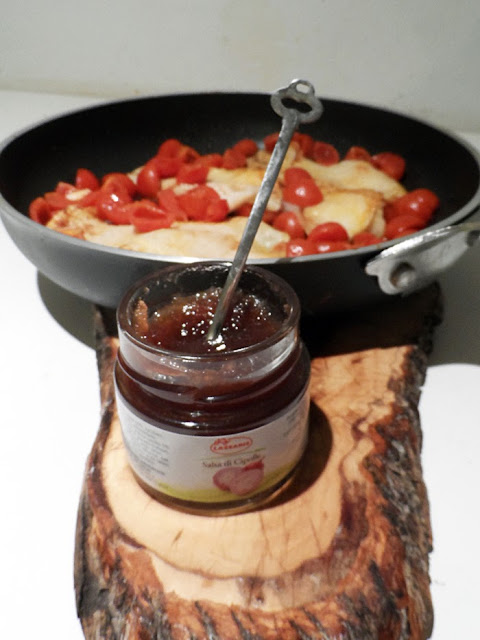 persico con pomodorini in salsa di cipolle