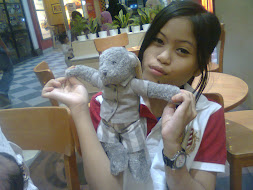 this is my friend at skool:) her name is nurul hikmah:) just call her nurul:)