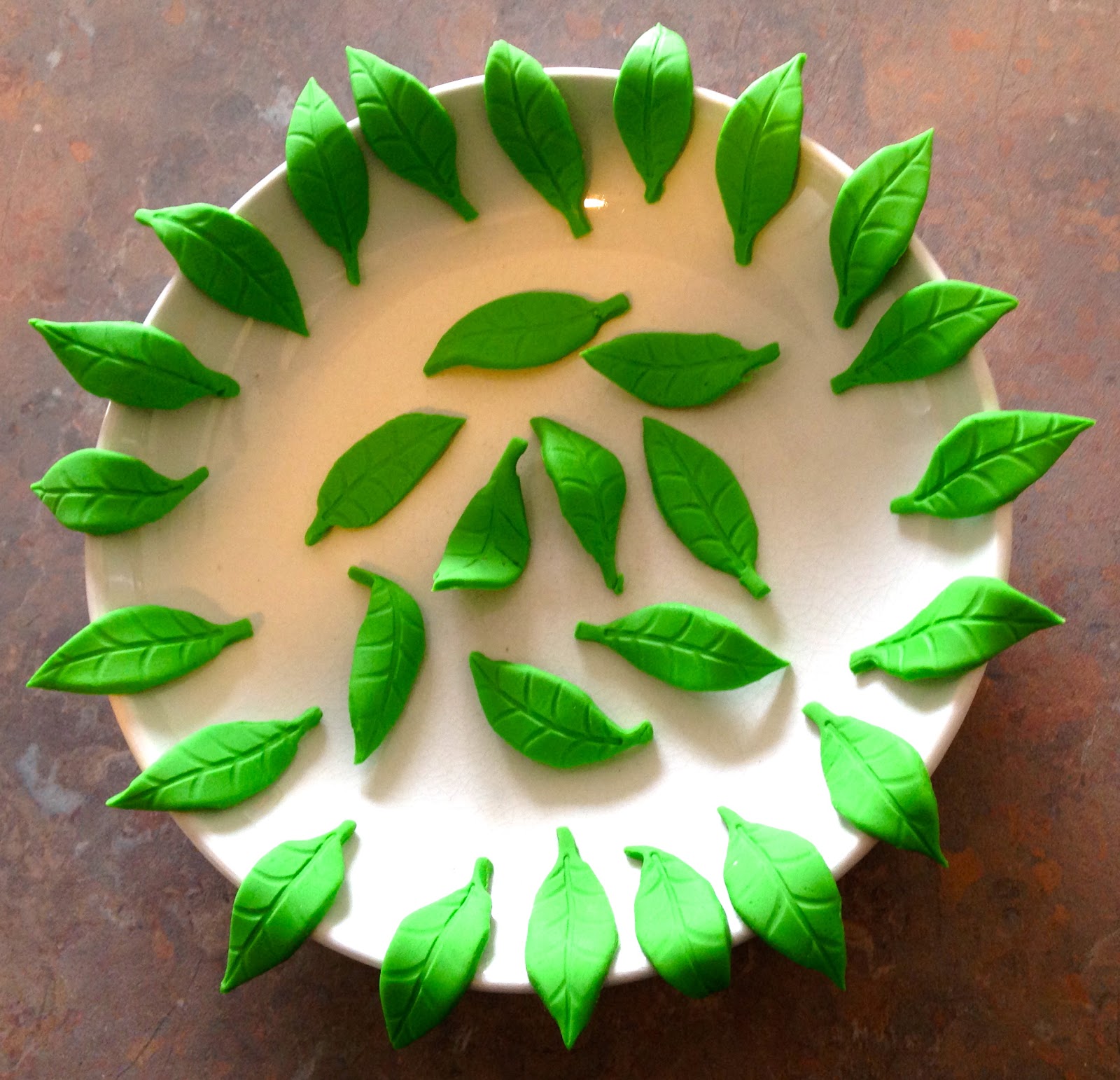 Dr Cupcake and Miss Macaron fondant leaves