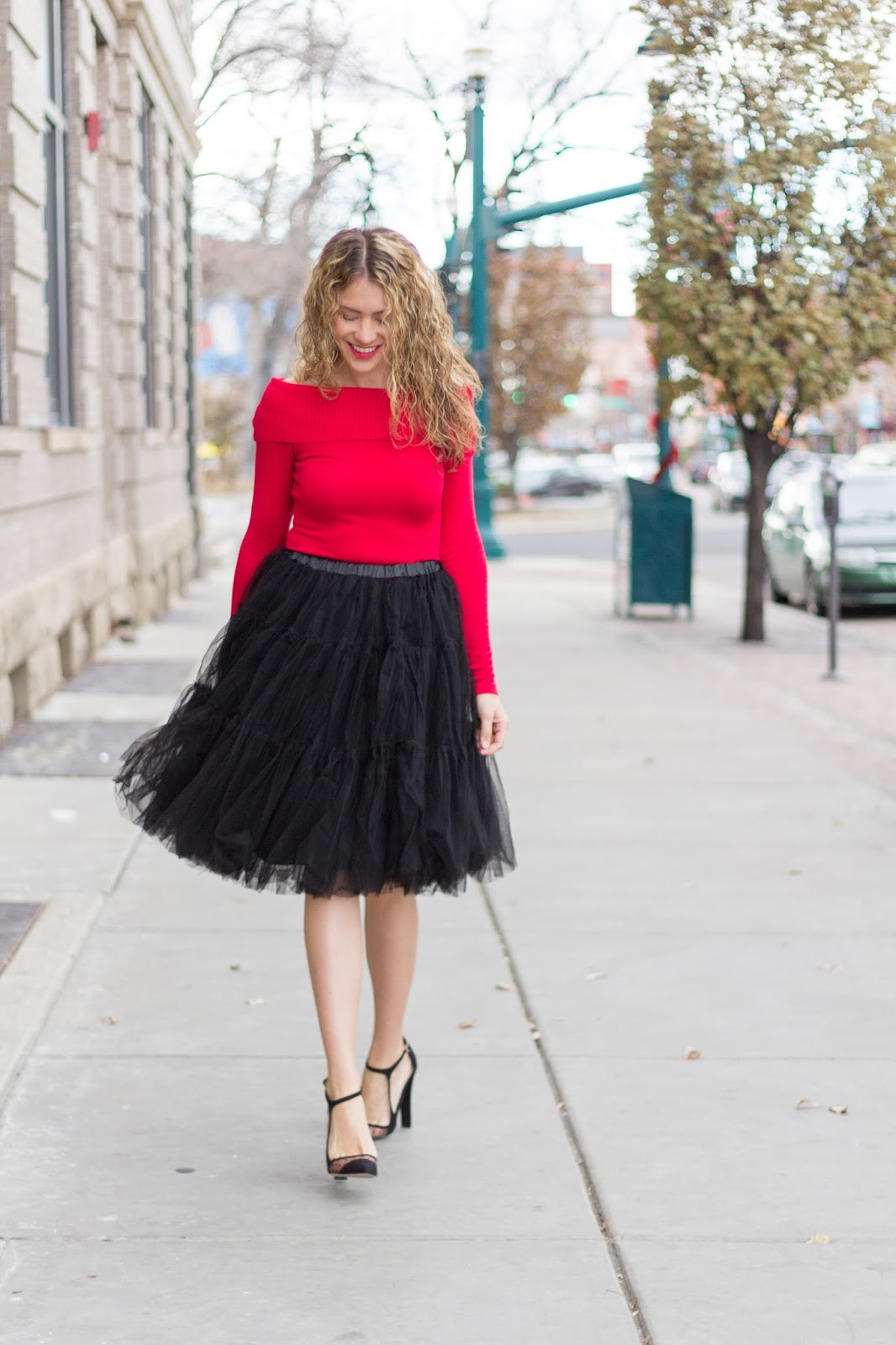 red top and black skirt