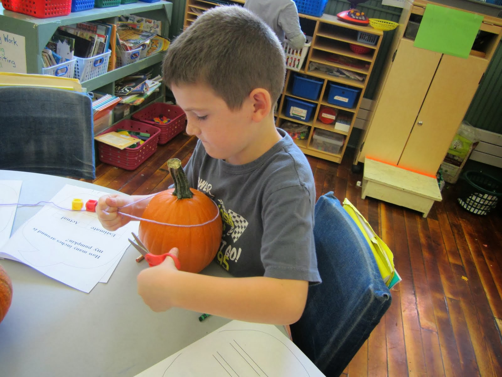 Using yarn and counting cubes.