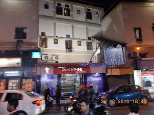 "Hotel Pushpak International"  at 10 Kyd Street.