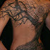 Dense old tree tattoo on back 