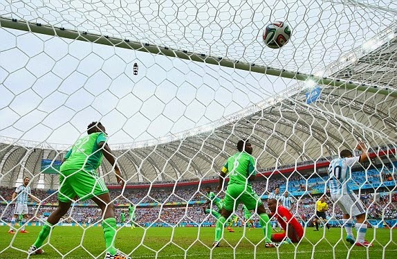 Lionel Messi scored twice as Argentina won a thriller against Nigeria