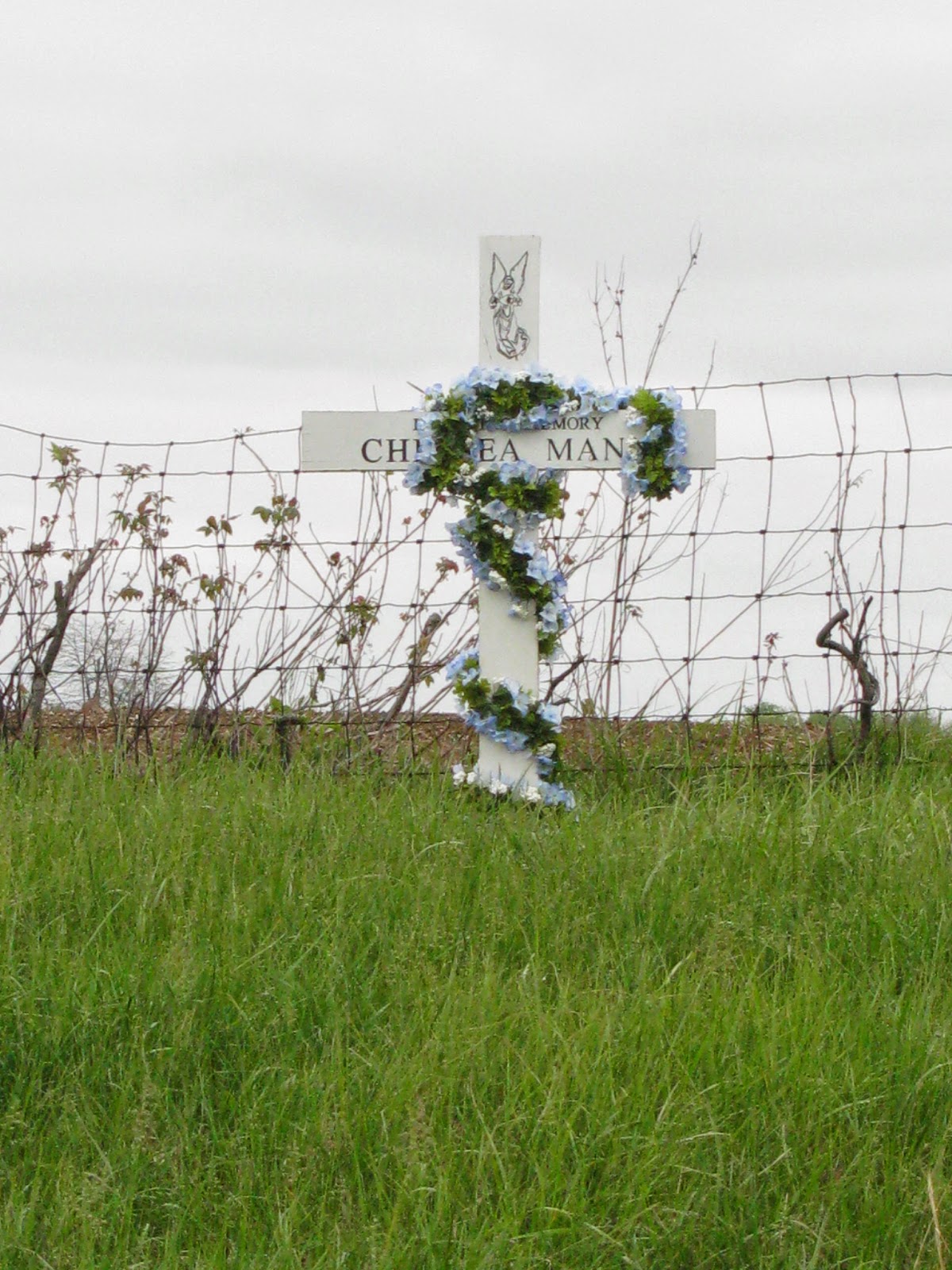 A Grave Interest Cross By the Side of the Road