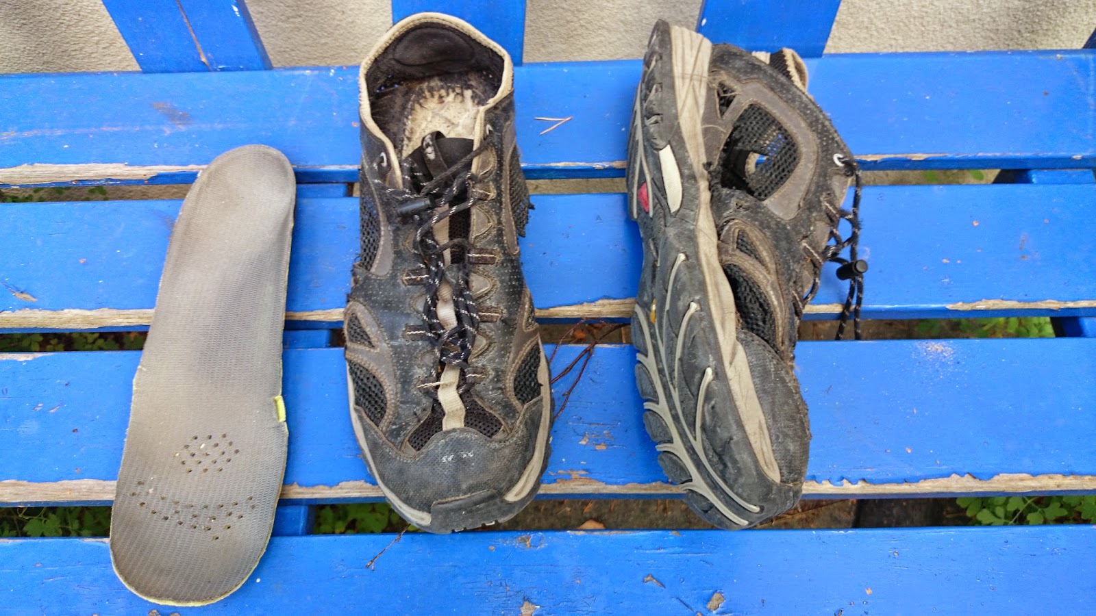 Brooks Range gear reflections on stove and footwear