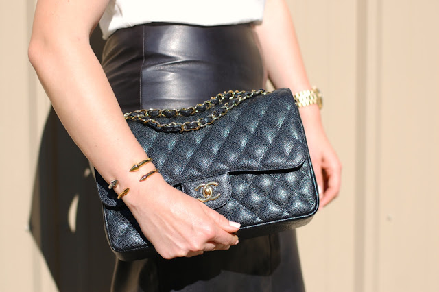 Danier leather skirt,Forever 21 silk tank,Chanel Jumbo classic flap,Zara heels,J.Crew necklace, Prada sunglasses