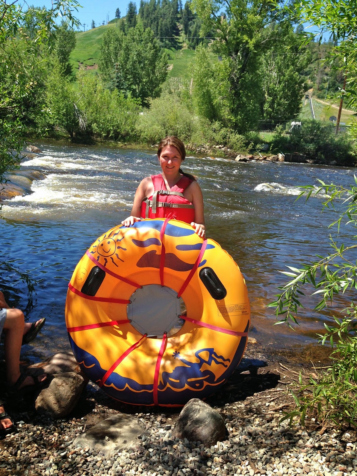 A Girl & Her Food Tubing on the Yampa River in Steamboat Springs, Colorado