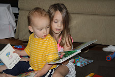 Elle reading to Anderson