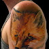 3D fox head tattoo on shoulder