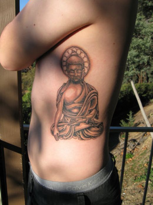 As I am a very spiritual person I got this buddha tattoo on my own belly 