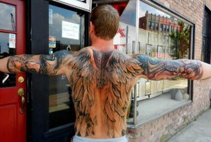 Full Angel feather tattoo on back body of a cool guy