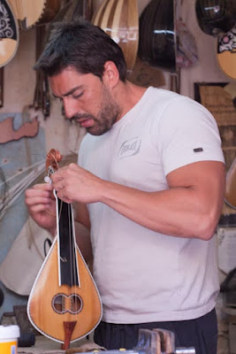 Lyre maker, finishing Cretan Lyre, Rethymno |Crete, Greece Lyre maker, Nikos Papalexakis, finishing Cretan Lyre, Rethymno |Crete, Greece
