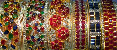 Ruby jewelry composition with gold and sapphire