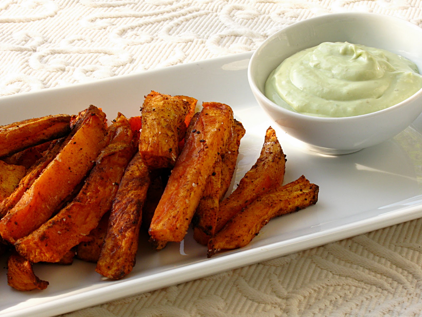 All That Splatters Sweet Potato Oven Fries with Avocado Dip