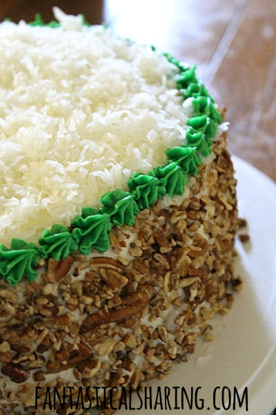 To Die For Carrot Cake | A classic carrot cake with coconut, pecans, and pineapple topped with cream cheese frosting #cake #dessert