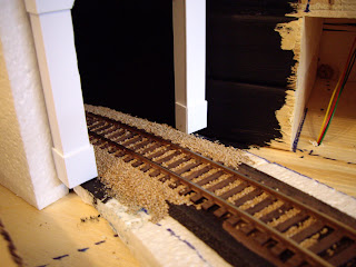 Tunnel entrance with track ballast