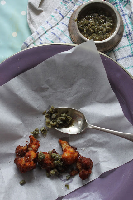 Fried cauliflower florets with capers. Gluten-free