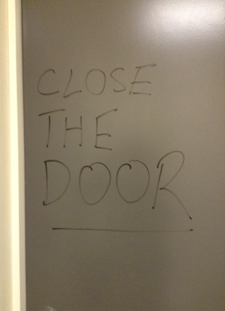 Written on the inside of the toilet door!
