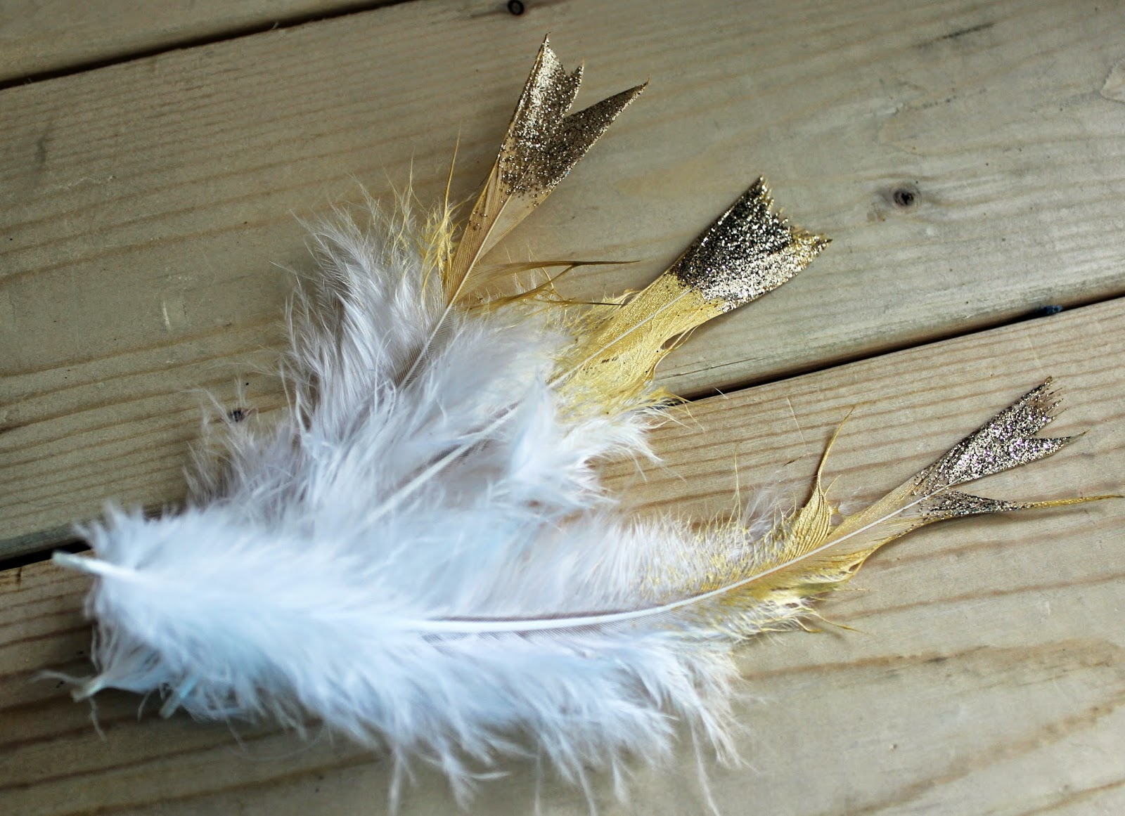 Kelsey Is... Gold Tipped Feathers