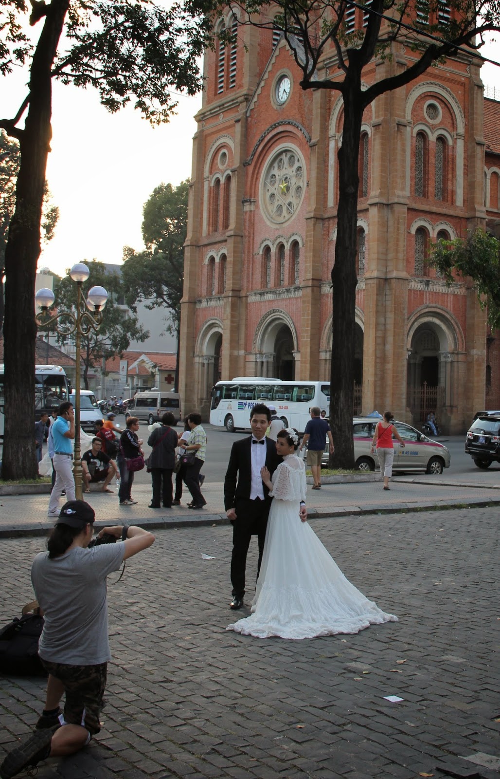 Bride and groom in front of Notre Dame cathedral. Bride and groom in front of Notre Dame cathedral.