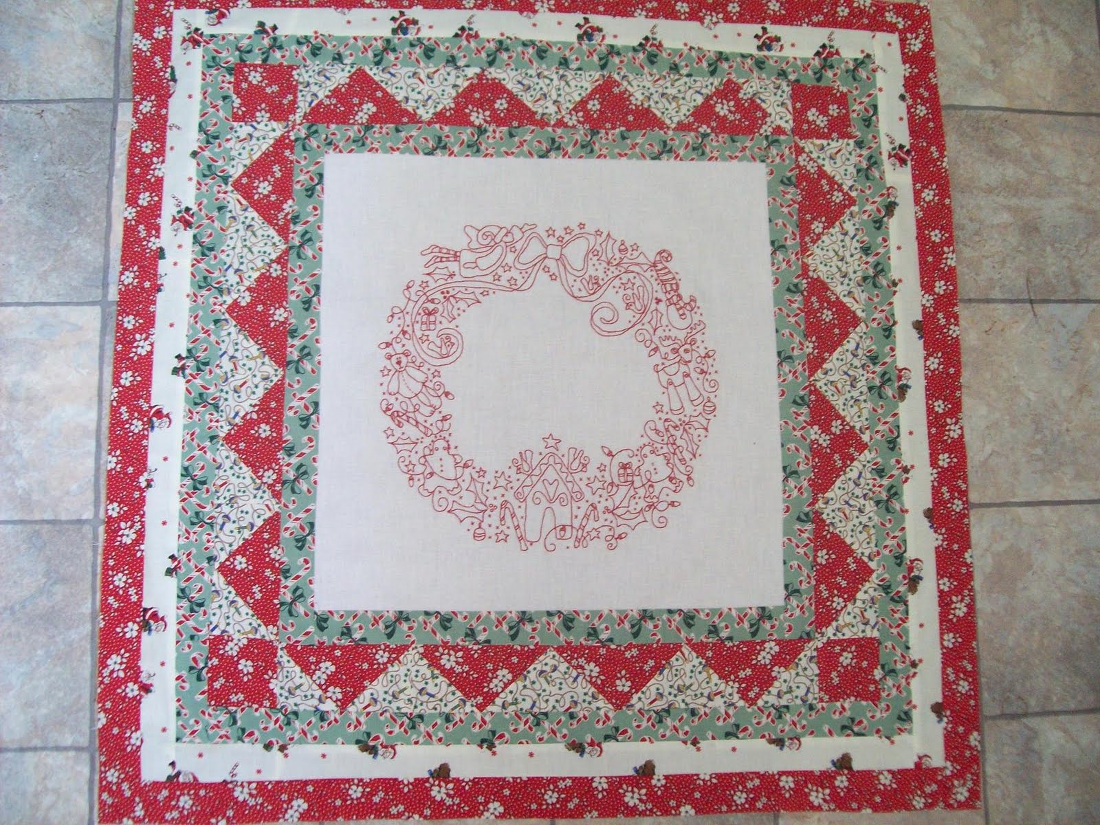 Piecing, Patching Christmas wreath quilt