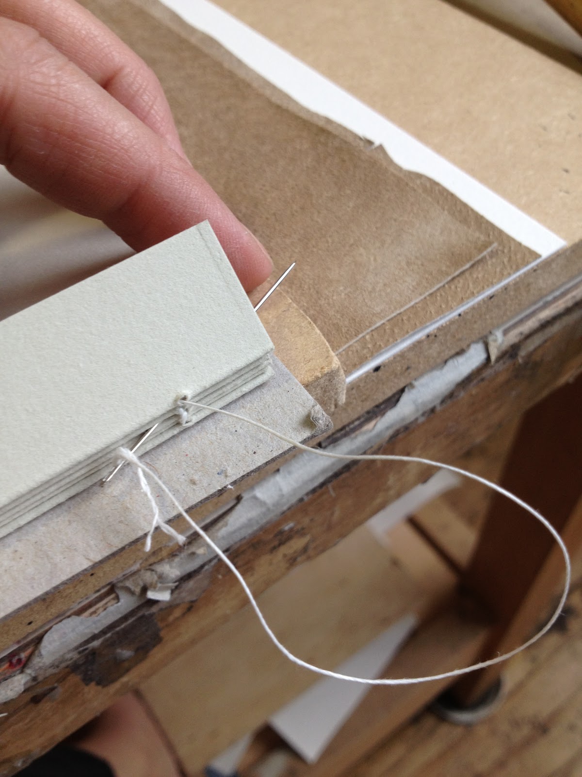 anything with a spine how to make a photo album / sewing a kettle stitch