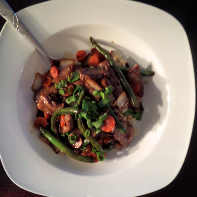 Szechuan Beef  Stir Fry:  A spicy beef stir fry, with bold flavors of ginger and garlic with just a hint of sweetness, made with leftover steak.