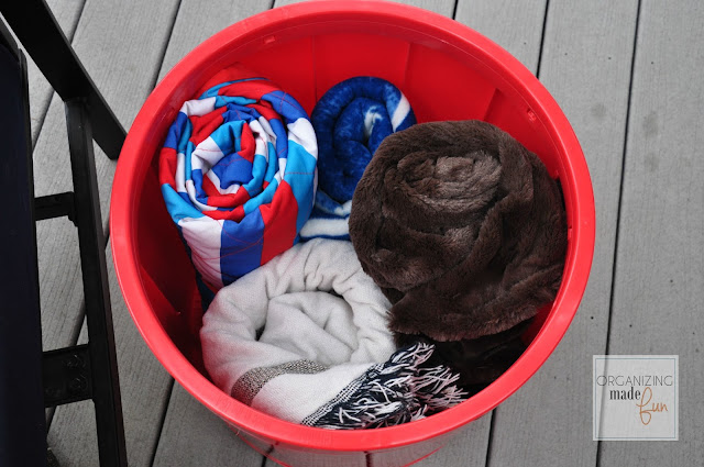 Inside storage Red Otto Storage Stool on patio :: OrganizingMadeFun.com