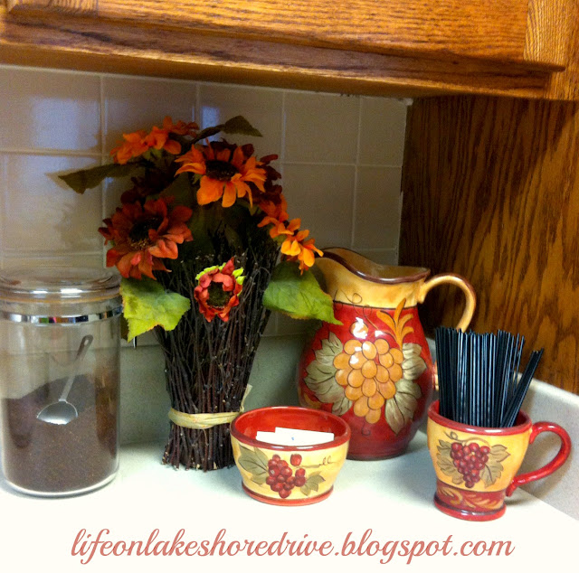 Red and gold kitchen vignette  tea pitcher