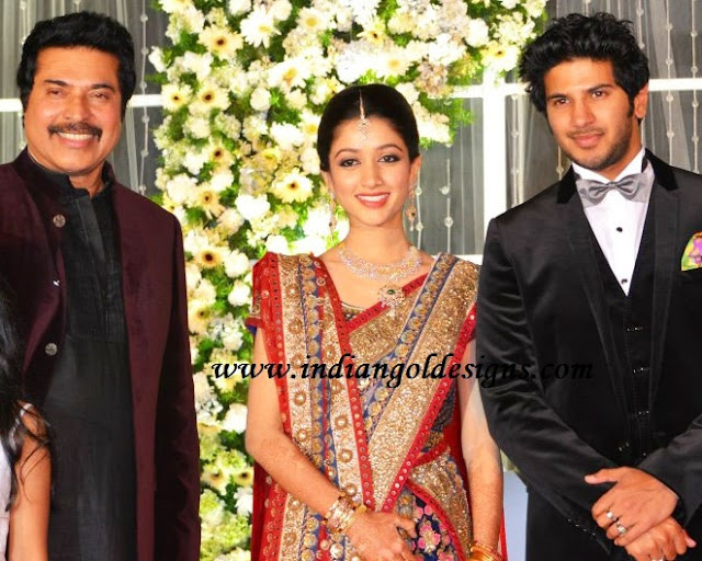 Gold and Diamond jewellery designs jewellery at mammootty son dalquar
