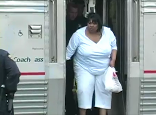Lakeysha Beard being removed from an Amtrak Train